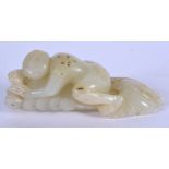 AN EARLY 20TH CENTURY CHINESE CARVED GREENISH WHITE JADE FIGURE Late Qing/Republic. 7.5 cm x 2.5 cm.
