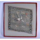 A CHINESE QING DYNASTY FRAMED SILK RANK BADGE depicting a bird in flight. Silk 30 cm square.