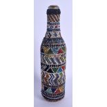 A NORTHERN AMERICAN BEAD WORK BOTTLE FLASK. 22 cm high.