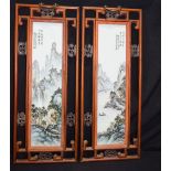 A framed pair of Famille Verte porcelain panels decorated with a landscape 68 x 28 cm (2)