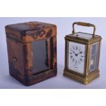 A 19TH CENTURY FRENCH BRONZE REPEATING ALARM CARRIAGE CLOCK with unusual engraved coronet glass top.