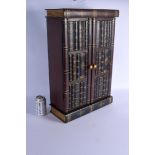 A LARGE IMITATION BOOK CARVED WOOD CABINET. 59 cm x 35 cm.