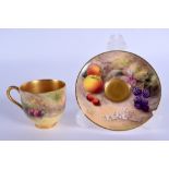 Royal Worcester demi tasse coffee cup and saucer painted with fruit by Ricketts, signed, date code f