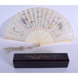A 19TH CENTURY CHINESE EXPORT CANTON IVORY FAN Qing, decorated with a silk dragon. 35 cm wide extend