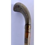 A 19TH CENTURY CONTINENTAL FULL LENGTH RHINOCEROS AND BUFFALO HORN WALKING CANE. 88 cm long.