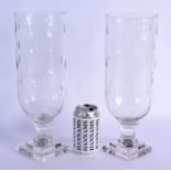 A PAIR OF EUROPEAN CELERY STORM STYLE GLASS VASES. 34 cm high.