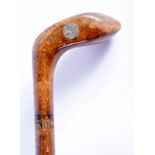 AN ANTIQUE GOLF SUNDAY STICK. 83 cm long.