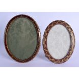 A PAIR OF EDWARDIAN MOROCCAN LEATHER TOOLED FRAMES Walter Dames of Piccadilly Largest 20 cm x 14 cm.
