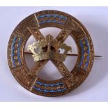 A LOVELY ANTIQUE YELLOW METAL AND ENAMEL BROOCH formed with a central coronet. 15 grams. 4.75 cm dia