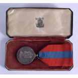 AN ELIZABETH II SILVER MEDAL presented to Harold Rother. 2.5 cm wide.