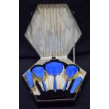 A lovely silver plate enamelled cased dressing table set largest 26cm.