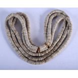 A VINTAGE TRIBAL POLYNESIAN SHELL NECKLACE possibly currency. 90 cm long.