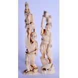 A PAIR OF 19TH CENTURY JAPANESE MEIJI PERIOD CARVED IVORY OKIMONO. Largest 25 cm high.