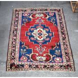 A Persian rug 206 x 160cm .