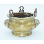 A Chinese Bronze hanging censer with beast head handles 11.5 x 7cm.