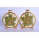 Graingers Worcester pair of moon flasks in painted and moulded with leaves c. 1890. 13.5cm high (2)