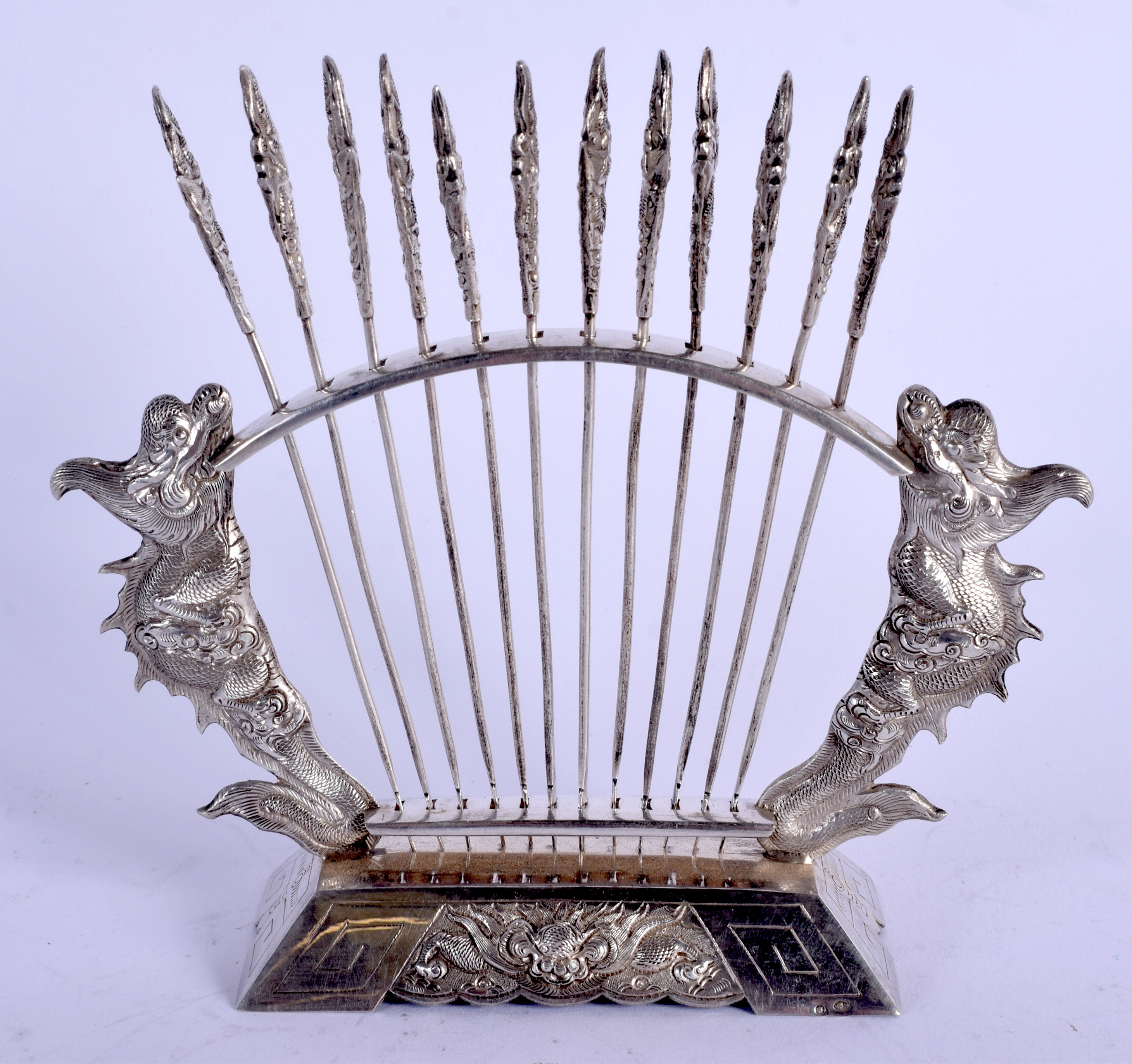 A VIETNAMESE SILVER TOOTH PICK HOLDER. 99 grams. 12 cm x 14 cm.