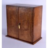 A LOVELY 19TH CENTURY CARVED WOOD TWO DOOR COLLECTORS CABINET possibly satinwood. 42 cm x 38 cm clos