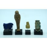 A collection of Egyptian articles including Lapis Lazuli and stone figures 11cm.