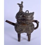 AN UNUSUAL CHINESE QING DYNASTY BRONZE ARCHAIC VESSEL AND COVER decorated with stylised birds and mo