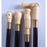 FOUR CONTINENTAL CARVED BONE WALKING CANES with ebonised shafts. Largest 95 cm long. (4)