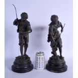 A PAIR OF ANTIQUE SPELTER FIGURES modelled as fisherman. Figure 38 cm high.