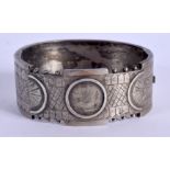 A VICTORIAN AESTHETIC MOVEMENT WHITE METAL BANGLE. 22 grams. 6 cm wide.