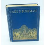 A rare copy of Alice's adventures in Wonderland Boots special edition with colour plates .