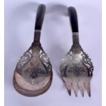 A PAIR OF 19TH CENTURY MIDDLE EASTERN ISLAMIC SILVER SERVING TONGS. 141 grams. 18 cm long.