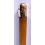 A 19TH CENTURY 9CT GOLD MOUNTED CARVED RHINOCEROS HORN SWAGGER STICK by Swaine & Adenay. 47 grams. 4