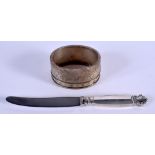 A GEORG JENSEN SILVER HANDLED KNIFE and a white metal bangle. 55 grams. (2)