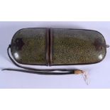 A LATE 19TH CENTURY CHINESE SHAGREEN SPECTACLE CASE with brass mounts. 17 cm x 7 cm.