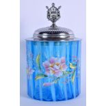 AN EDWARDIAN ENAMELLED BLUE FLASH BISCUIT BARREL AND COVER decorated with flowers. 19 cm high.