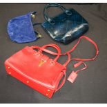 A Saint Laurent leather handbag together with a Longchamp bag (2).