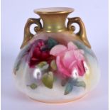 Royal Worcester two handled vase painted with roses date code for 1913. 8.5cm high
