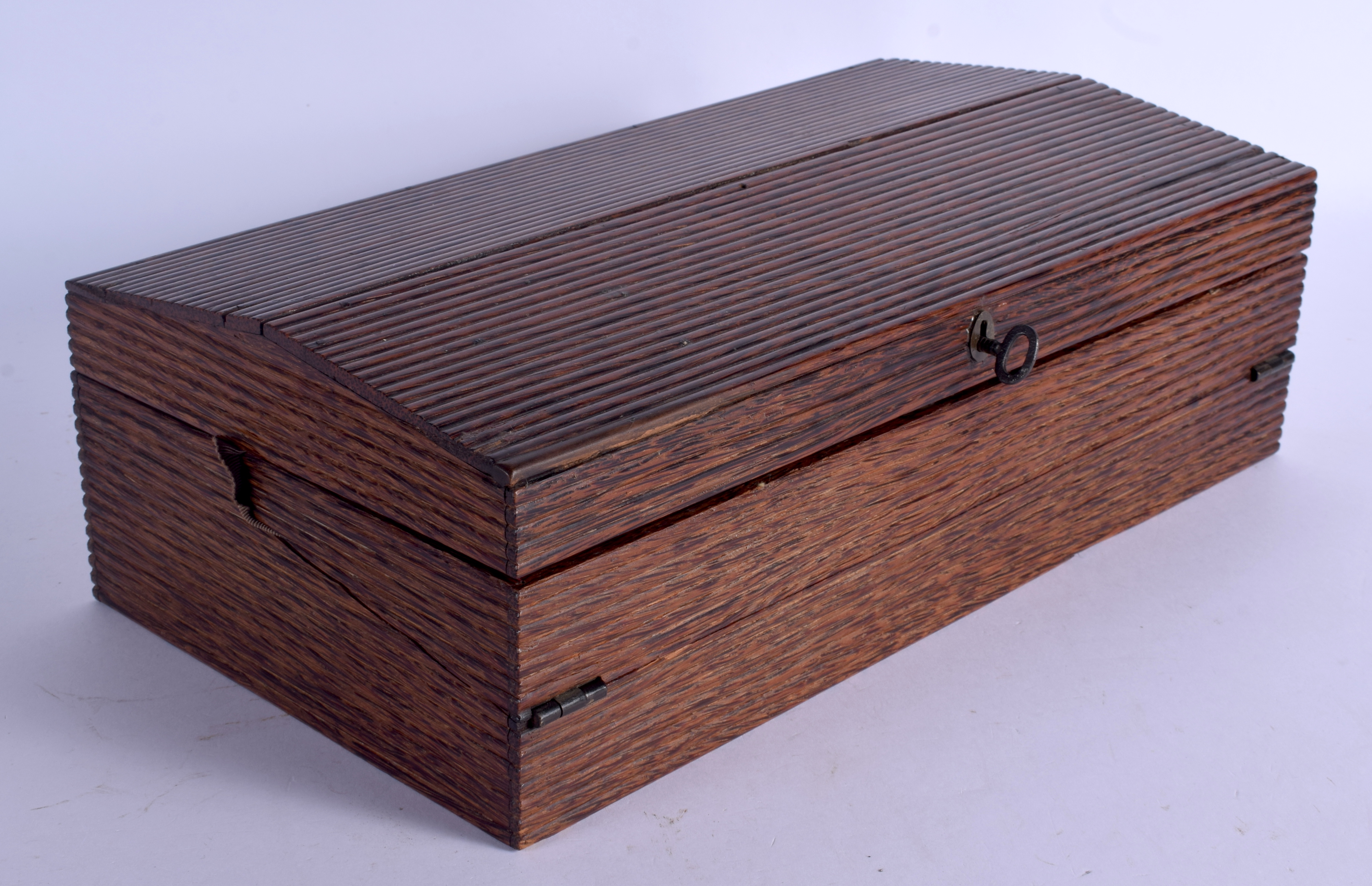 A 19TH CENTURY ANGLO INDIAN CARVED PALM WOOD WRITING SLOPE. 37 cm x 23 cm.