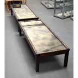 A NEAR PAIR OF 19TH CENTURY CHINESE MIRRORED HARDWOOD COFFEE TABLES decorated with foliage. 143 cm x