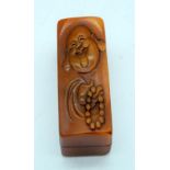 A Chinese Soapstone seal contained within a carved box 8cm.