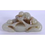 A CHINESE CARVED GREEN JADE FIGURE OF THREE CHILDREN 20th Century. 8 cm x 5 cm.