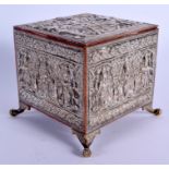 A 19TH CENTURY INDIAN SILVER OVERLAID CASKET decorated with Buddhistic figures. 12 cm x 9 cm.