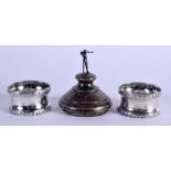 TWO ANTIQUE SILVER NAPKIN RINGS and a golfing silver lid. 56 grams. Largest 7 cm x 6 cm. (3)