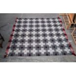 A large double sided Welsh blanket 230 x 220cm.