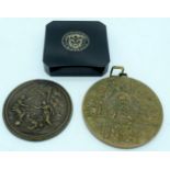 A large religious bronze plaque together with a another and a Peruvian yellow metal broach 10cm (3)