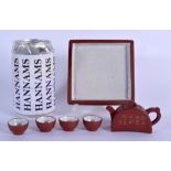 A VERY RARE EARLY 20TH CENTURY CHINESE MINIATURE YIXING TEASET upon a tray. Tray 9.25 cm square. (6)