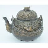 A Chinese bronze heavily embossed Tea pot 13 x 18cm.