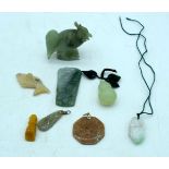 A collection of Jade and hard stone including a Cockerel , pendants etc (8) 6cm .