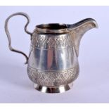 AN ANTIQUE RUSSIAN SILVER CREAM JUG. 105 grams. 10 cm x 8 cm.