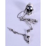 A SILVER SKULL ON CHAIN. 60 grams. 30 cm long.