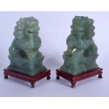 A PAIR OF EARLY 20TH CENTURY CHINESE CARVED JADE FIGURES OF LIONS Late Qing/Republic. Jade 12 cm x 6