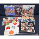 A Collection of 12 inch LP's Beetles, Cream Janis Joplin etc (8).